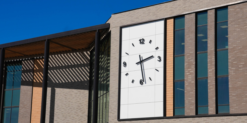 Orem City Hall highlighting the large white clock on the south side of the building