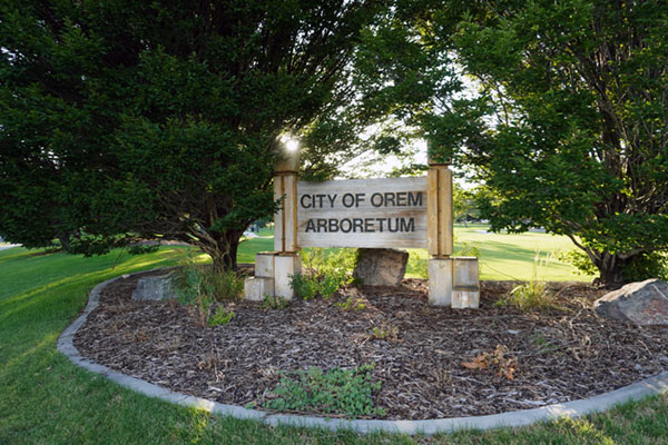 The Orem Arboretum sign on the South East corner of the park.