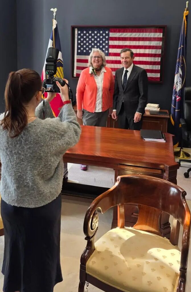 Mayor McCandless and Senator Curtis pose for a photo